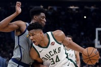 Milwaukee Bucksu2019 Giannis Antetokounmpo (34) drives to the basket against Indiana Pacersu2019 Thaddeus Young during the second half of their matchup in Milwaukee, March 7, 2019.