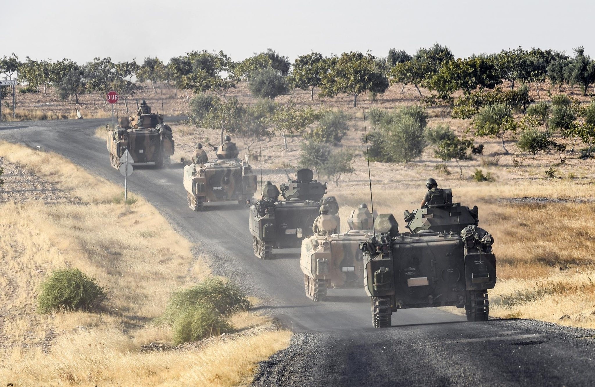 Turkish troops move toward the border with Syria as part of preparation in Operation Euphrates Shield last year.