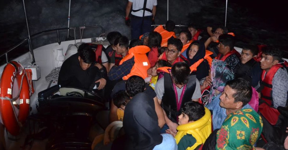 Migrants aboard a Coast Guard Command boat after they were intercepted off the coast of u0130zmir, July 11, 2019.