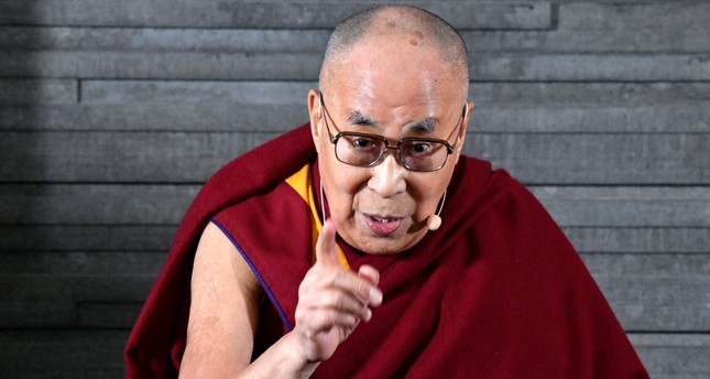 The Tibeteans spiritual leader, the Dalai Lama (C), speaks during meeting with the press in Malmo, Sweden, September 12, 2018. (EPA Photo)