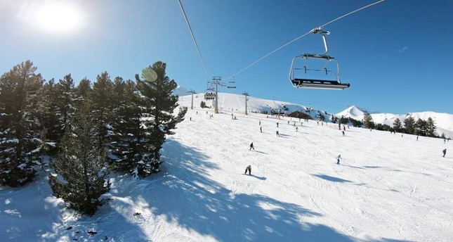 Skiers are seen on a slope at the mountain resort of Bansko in Bulgaria. iStock Photo