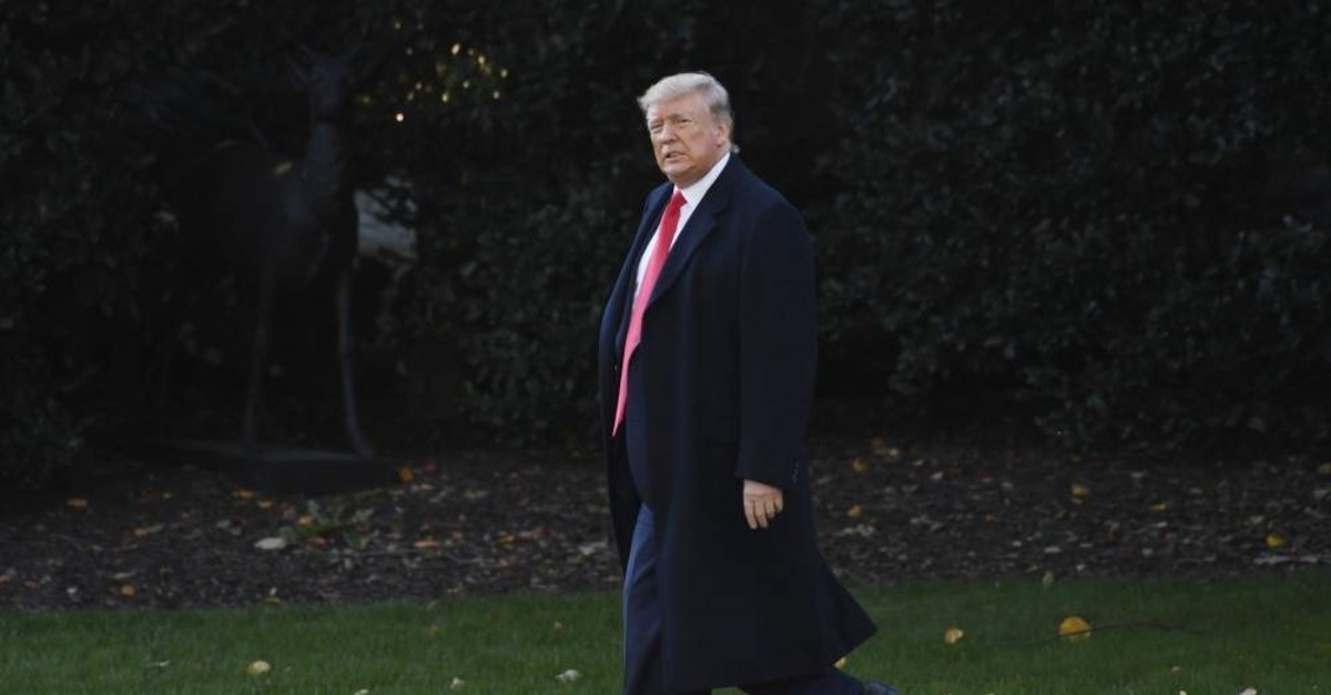 President Donald Trump walks out talks to reporters on the South Lawn of the White House in Washington, Friday, Nov. 1, 2019. Trump is heading to Mississippi for a campaign event. (AP Photo)