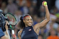 Serena Williams prepares to hit an autographed ball into the crowd at the 2016 Summer Olympics in Rio de Janeiro, Brazil. (AP Photo)