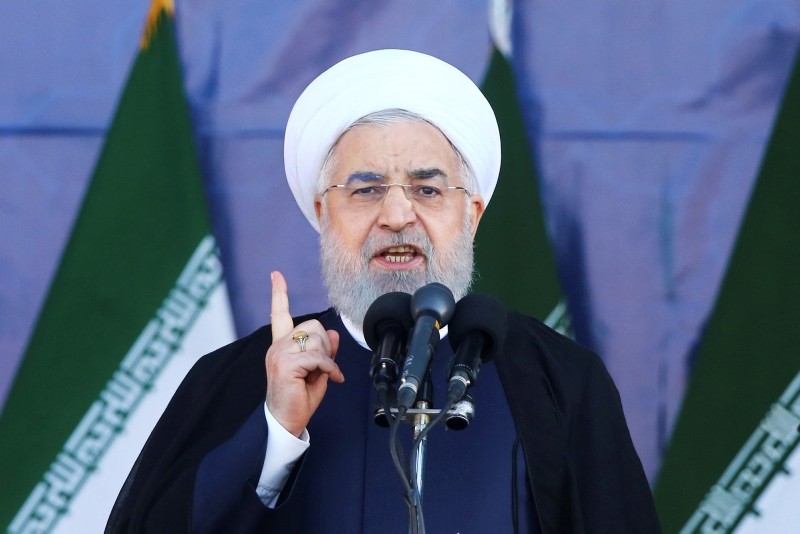 Iran's President Hassan Rouhani speaks at a military parade marking the 38th anniversary of Iraq's 1980 invasion of Iran, in front of the shrine of the late revolutionary founder, Ayatollah Khomeini, outside Tehran, Iran, Sept. 22, 2018. (AP Photo)