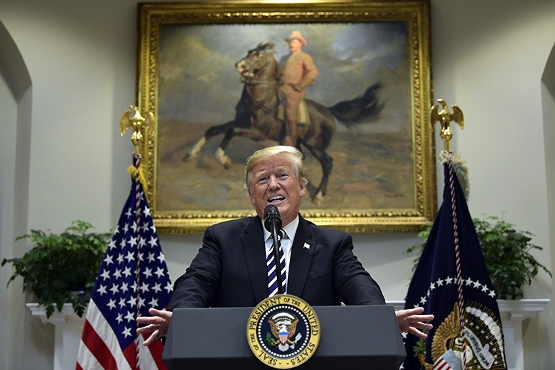President Donald Trump talks about immigration and gives an update on border security from the Roosevelt Room of the White House in Washington, Thursday, Nov. 1, 2018. (AP Photo)