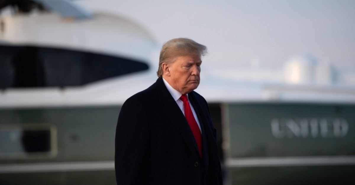 US President Donald Trump boards Air Force One prior to departure from Joint Base Andrews in Maryland, January 9, 2020, as he travels to Toledo, Ohio to hold a campaign rally. (AFP Photo)
