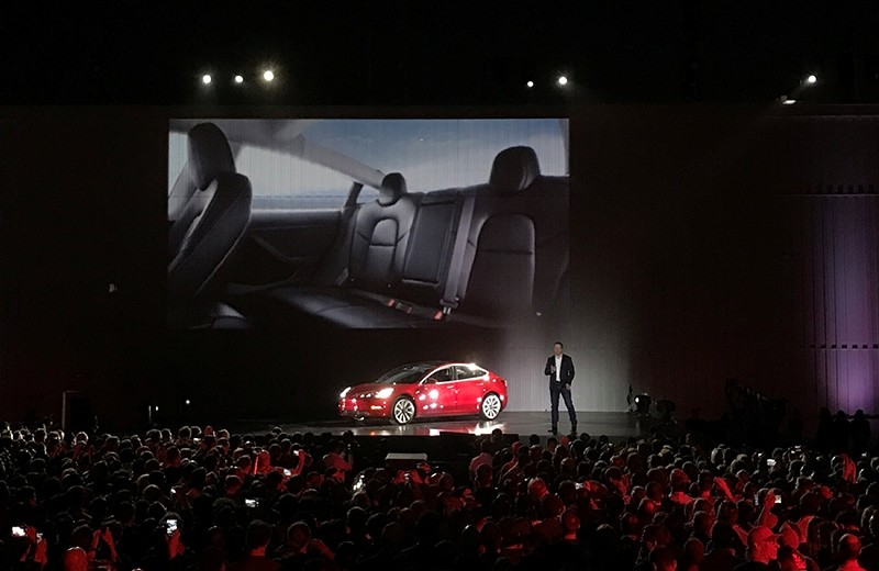 Tesla Chief Executive Elon Musk introduces one of the first Model 3 cars off the Fremont factory's production line during an event at the company's facilities in Fremont, California, U.S., July 28, 2017. (Reuters Photo)
