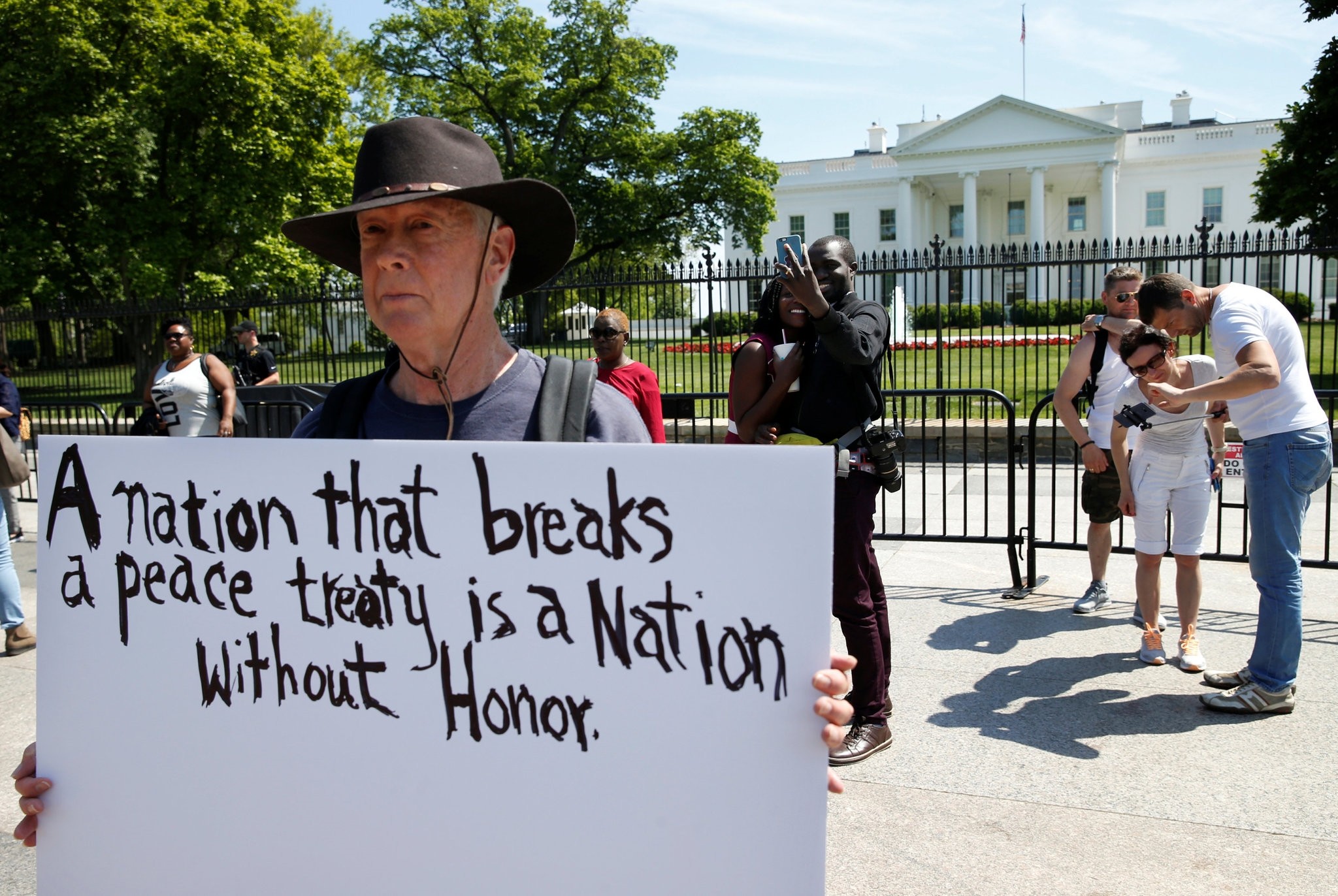 David Barrows protests outside of the White House as U.S. President Donald Trump announces the U.S.u2019s withdrawal from the Iran nuclear deal, May 8. 