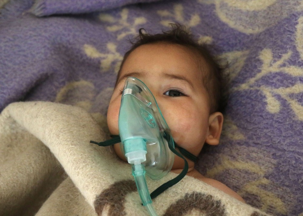 A Syrian child receives treatment at a small hospital in the town of Maaret al-Noman following a suspected chemical attack in Khan Sheikhun, a nearby rebel-held town in Syria's northwestern Idlib province, April 4, 2017.