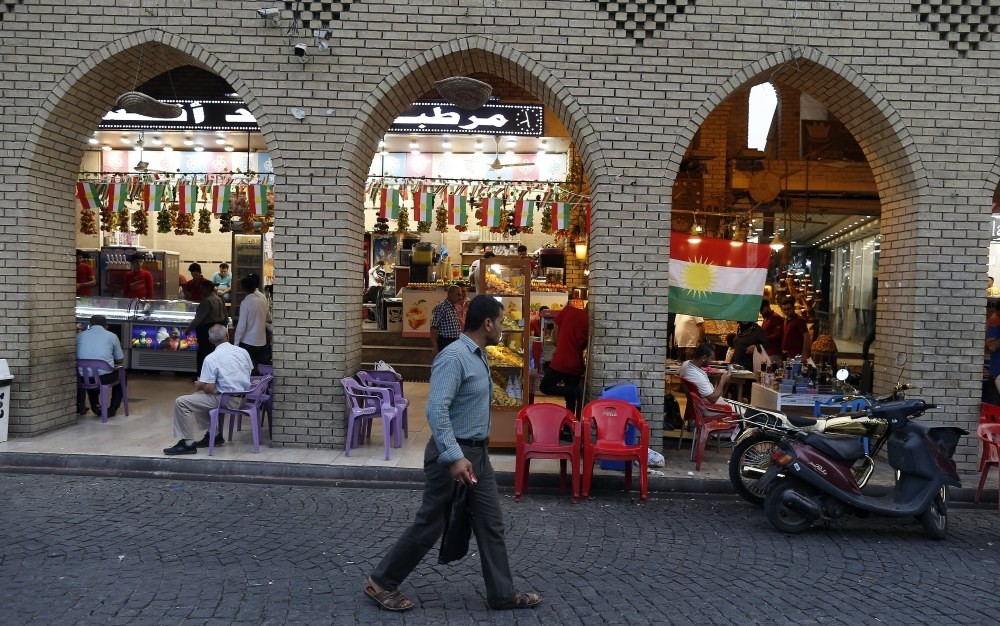 An Iraqi Kurdish man walks in the old city of Irbil, in the Kurdistan region in northern Iraq, Sept. 26, 2017. 