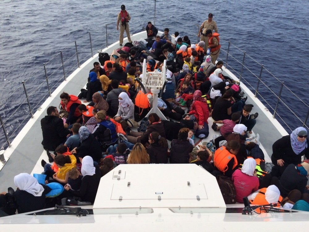 Syrian migrants aboard a Turkish Coast Guard boat after they were intercepted off the shores of Finike in southern Turkey.