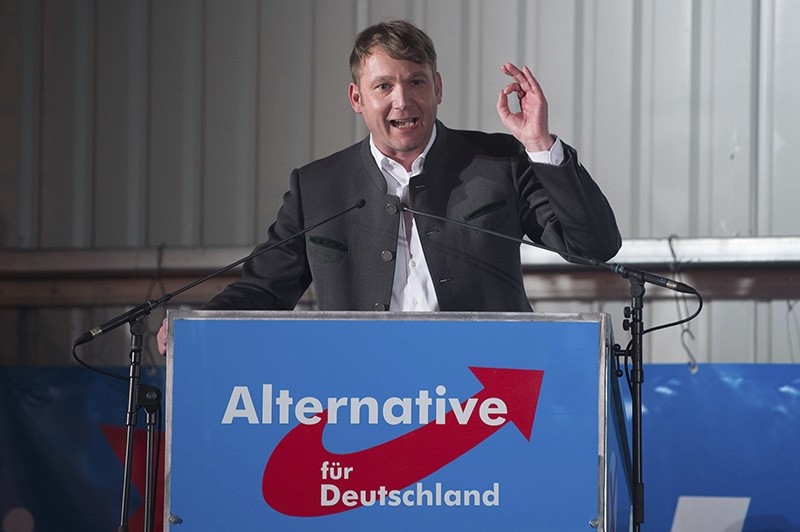 In this Feb. 14, 2018 photo Andre Poggenburg, head of the nationalist AfD in German state of Saxony-Anhalt, speaks during a party rally in Nentmannsdorf near Pirna, eastern Germany, where he insulted Turkish people. (AP Photo)