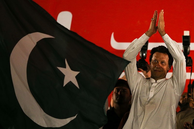 Imran Khan, chairman of the Pakistan Tehreek-e-Insaf (PTI) gestures to his supporters during a campaign meeting ahead of general elections in Islamabad, Pakistan, July 21, 2018. (Reuters Photo)