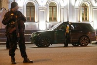 An investigator inspects a car at a site of a murder attempt on the lawmaker of the Kiev regional council and businessman Viacheslav Soboliev in Kiev, Ukraine Dec. 1, 2019.  (Reuters Photo)
