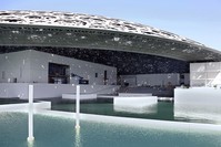 Abu Dhabiu2019s Louvre museum, designed by French architect Jean Nouvel, surrounded by sea water. 