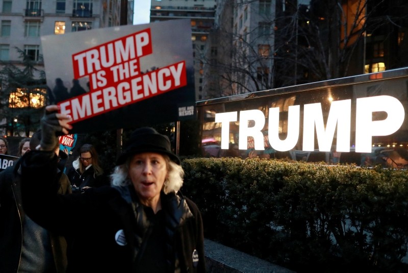 People gather to protest against U.S. President Donald Trump's declaration of a national emergency to build a border wall, at Trump International Hotel & Tower in Manhattan, New York, U.S. February 15, 2019. (Reuters Photo)