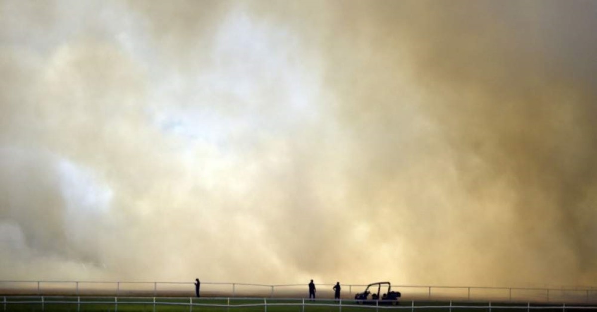 A bushfire burns outside the Perth Cricket Stadium in Perth, Dec. 13, 2019. (AFP Photo)
