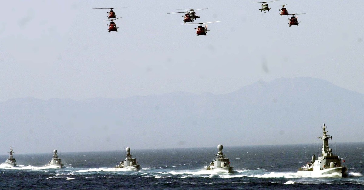 Turkish battleships accompanied by helicopters move in the 2003 edition of Sea Wolf exercise.