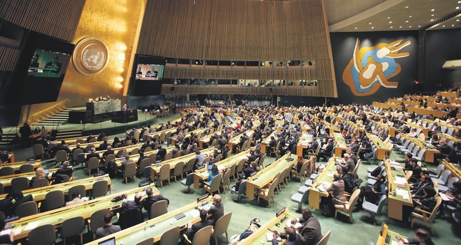 People gather at the General Assembly, prior to a vote, Thursday, Dec. 21, at the United Nations headquarters.