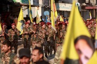 YPG terrorits demonstrate with flags and others bearing the portrait of PKK leader Abdullah u00d6calan in the town of al-Muabbadah, Hassakah, Feb. 24. 