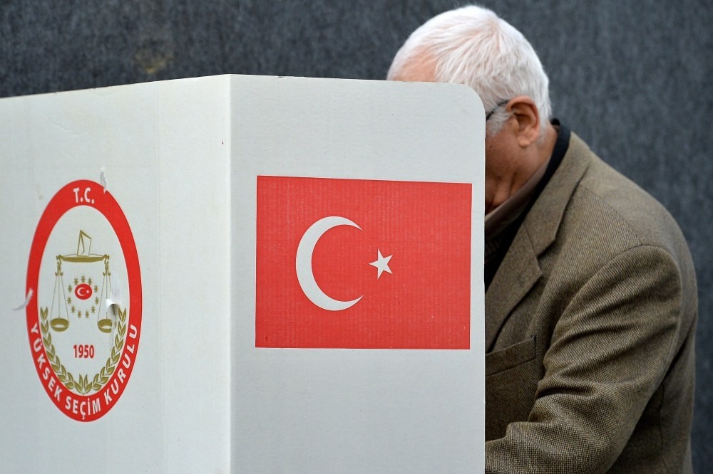 A man casting his vote for the Turkish referendum, at the Turkish Consulate in Geneva, Switzerland, March 28.