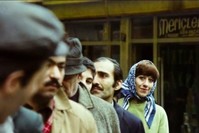 Ayu015fen Gruda in the 1977 film u201cu00c7u00f6pu00e7u00fcler Kralu0131u201d (u201cKing of the Street Cleanersu201d), where she starred with great actors Kemal Sunal and u015eener u015een.