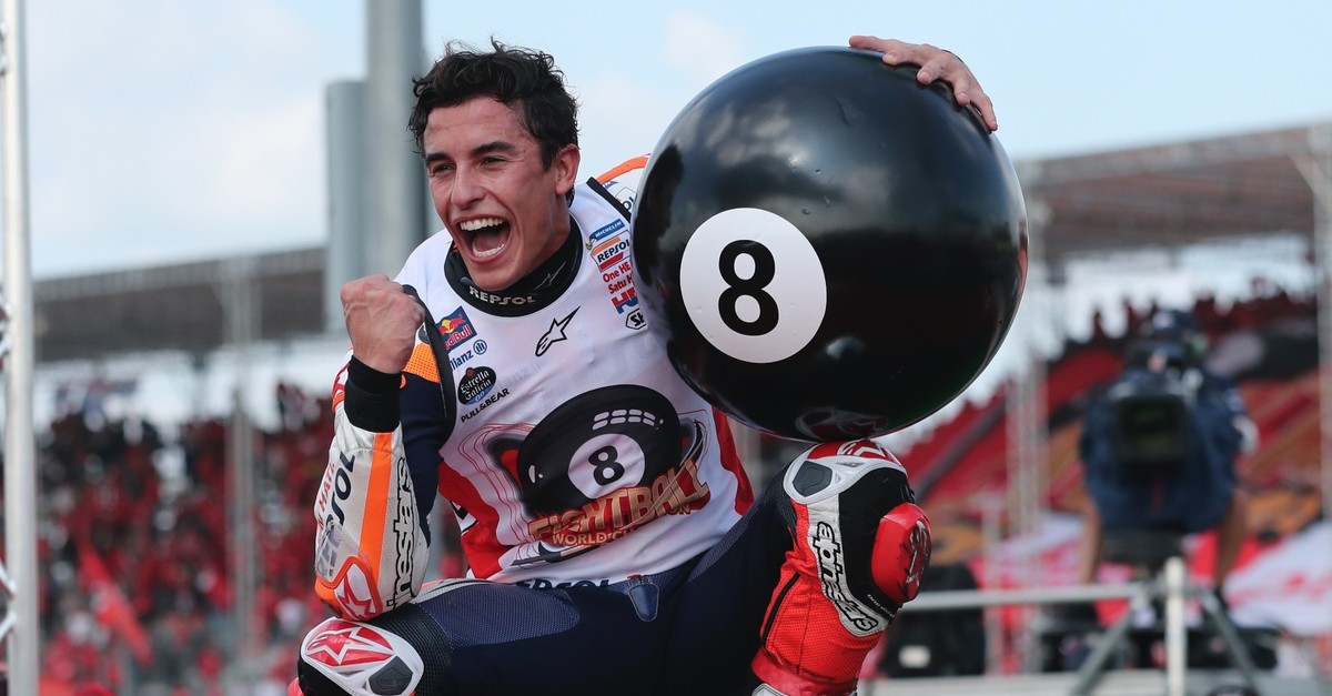 Spainu2019s rider Marc Marquez, captain of the Repsol Honda Team, celebrates with a giant 8 ball after winning Thailandu2019s  MotoGP and his 8th Moto GP Championship at the Chang International Circuit in Buriram, Thailand, Oct. 6, 2019. 