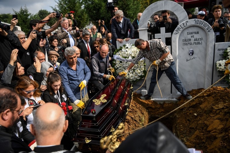 Güler's coffin is about to be deposited in the grave at the Şişli Armenian cemetery in Istanbul on October 20, 2018.