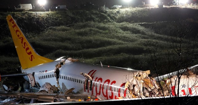 A view of the Pegasus Airlines Boeing 737-86J plane, that overran the runway during landing and crashed, at Istanbul's Sabiha Gokcen airport, Turkey February 5, 2020. Reuters Photo