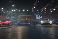 President Recep Tayyip Erdou011fan stands between two models of Turkey's first domestically developed automobile during the launching ceremony, Gebze, Kocaeli, Dec. 27. 2019. (AA Photo)