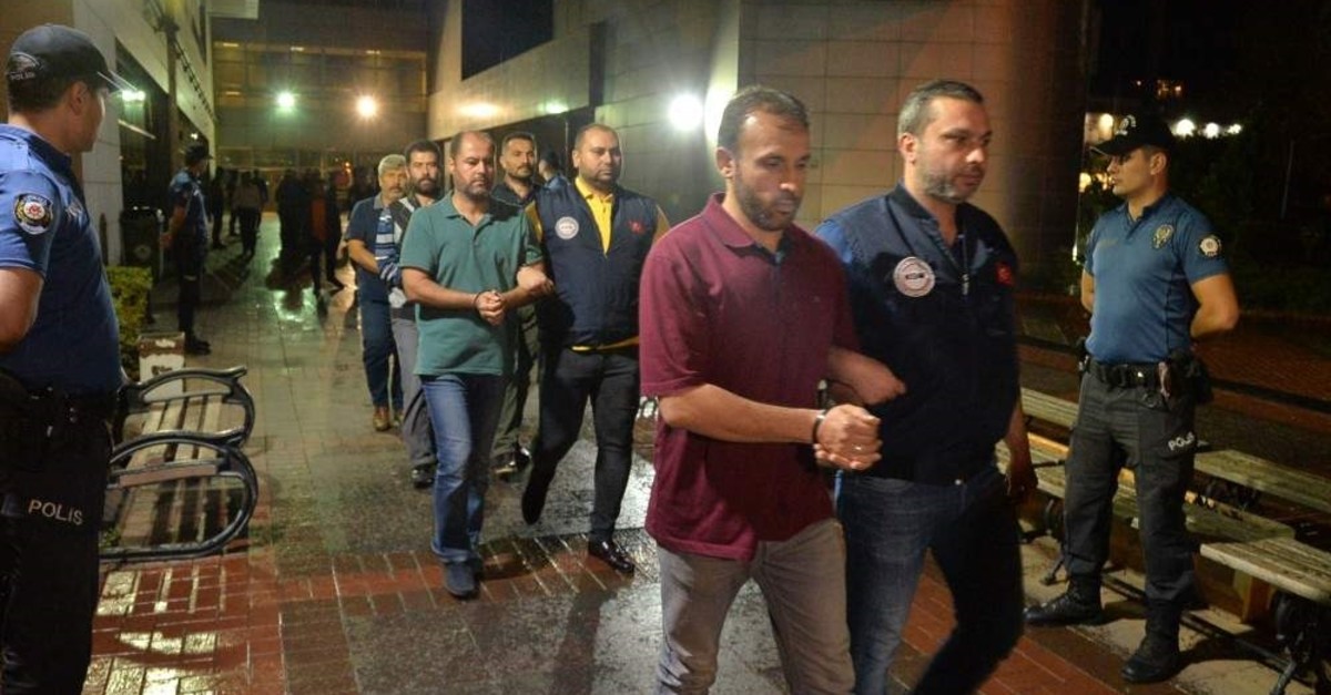 Police accompany 14 FETu00d6 suspects to prison, Mersin, Oct. 29, 2019. The terrorist group faces operations almost on a daily basis since the 2016 coup attempt. (DHA Photo)