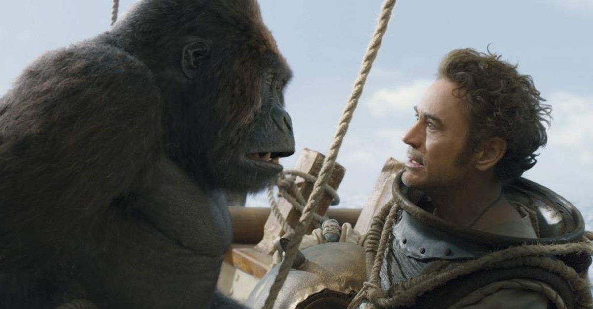 This image released by Universal Pictures shows Chee-Chee, voiced by Rami Malek, left, and Dr. John Dolittle, portrayed by Robert Downey Jr. in a scene from ,Dolittle., (AP Photo)
