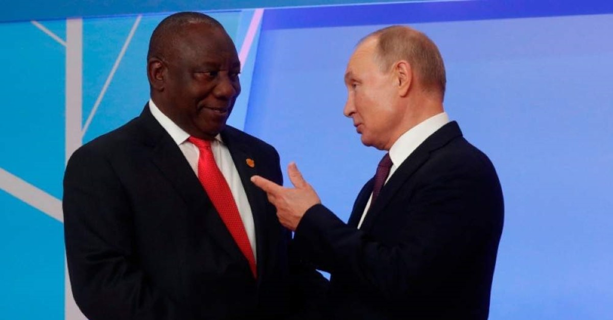 Russian President Vladimir Putin greets South African President Cyril Ramaphosa during the official welcoming ceremony for the heads of state and government at the 2019 Russia-Africa Summit in Sochi on Oct. 23, 2019. (AFP)
