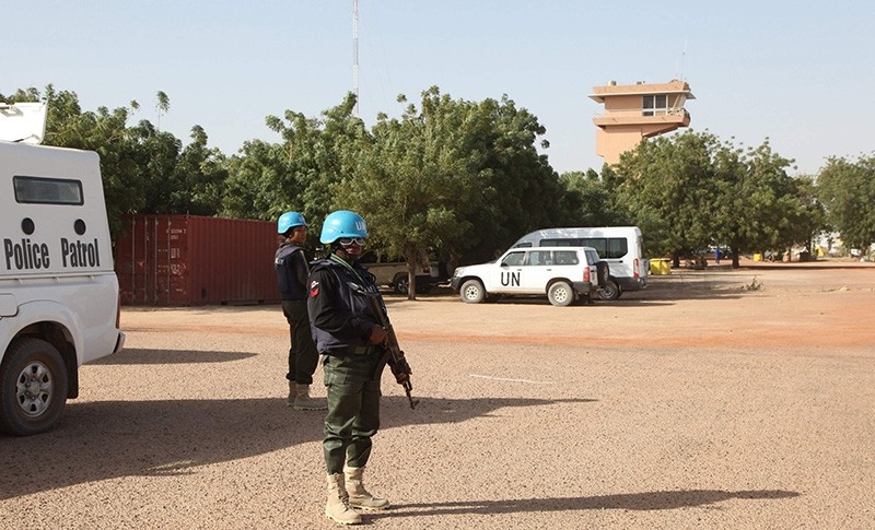 This file photo taken on February 04, 2016 shows UN peacekeepers standing guard near Timbuktu's airport. (AFP Photo)