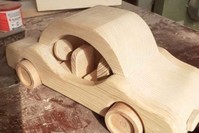 A wooden toy car for children to play safely with. (AA Photo)