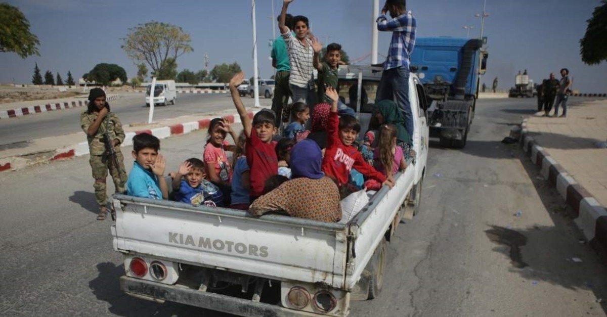 Civilians, who had to flee their hometown, are returning to Tal Abyad after terrorist groups were cleared from the region, Oct. 16, 2019.
