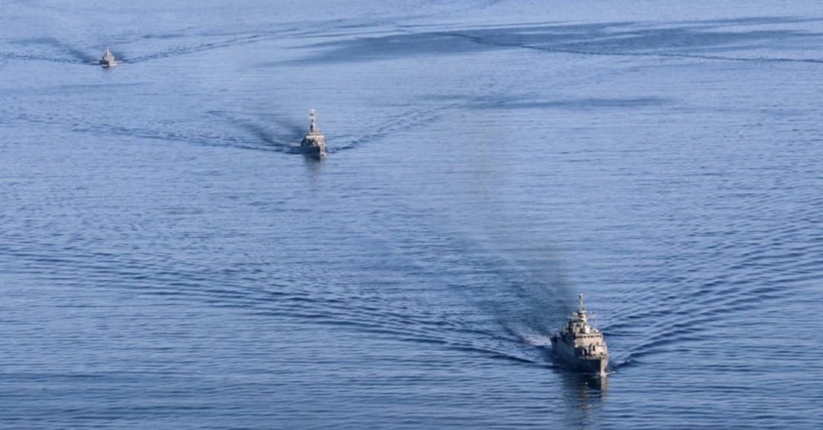 A handout photo made available by the Iranian Army office on December 28, 2019 shows a view of warships during joint Iran-Russia-China naval drills in the Indian Ocean and the Gulf of Oman. (AFP Photo)