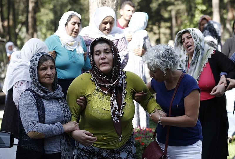 Emine Ayhan (C) lost four of her five children in the attack (EPA Photo)