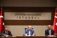 President Recep Tayyip Erdou011fan addresses reporters before his departure for the Tajikistani capital Dushanbe, Istanbul, June 14, 2019.