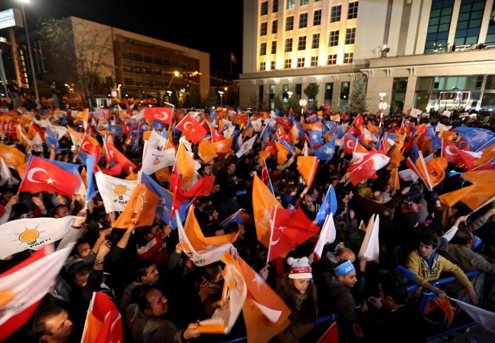 AK Party supporters celebrate after hearing the early results of the elections in front of the party headquarters in Ankara, Nov. 1, 2015. 