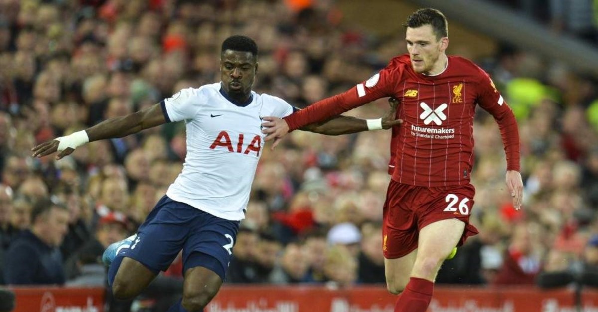 Tottenham Hotspur's Serge Aurier (L) in action against Liverpool's Andrew Robertson (R), in Liverpool, Oct. 27, 2019.  (EPA Photo)