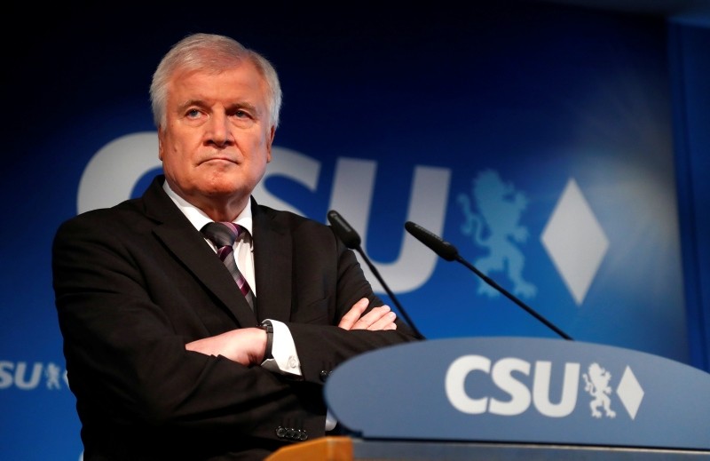 In this Oct. 15, 2018 file photo German Interior Minister and CSU chairman Horst Seehofer attends a press conference at the headquarters of the Christian Social Union, CSU, in Munich, Germany. (AP Photo)