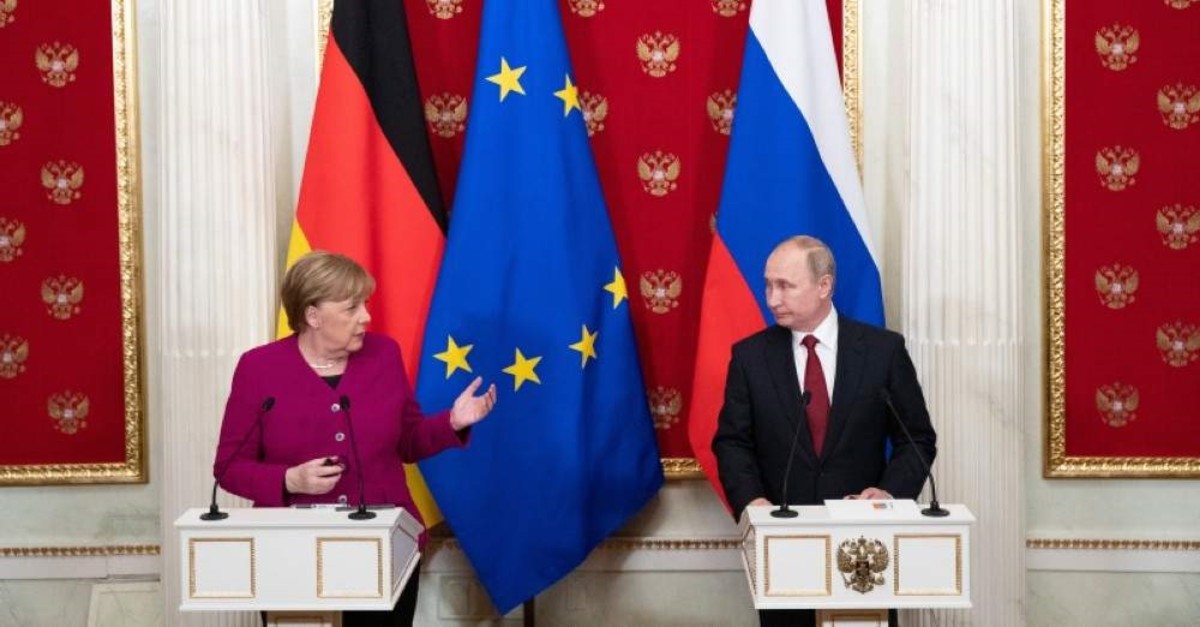 Russian President Vladimir Putin (R)  and German Chancellor Angela Merkel (L) attend their joint news conference after their talks in the Kremlin in Moscow, Russia, Saturday, Jan. 11, 2020. (AP Photo)