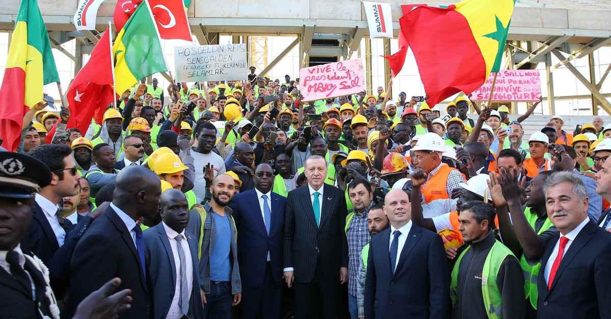 This file photo dated April 3, 2018 shows President Recep Tayyip Erdou011fan and his Senegalese counterpart Macky Sall visiting a construction site undertaken by Turkish companies in Dakar, Senegal. (AA Photo)
