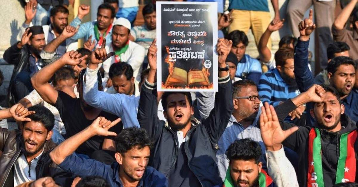Members and activists of Social Democratic Party of India (SDPI) hold posters and shout slogans against the Citizenship Amendment Bill 2019 during a protest demonstration in Bangalore, Dec. 10, 2019. (AFP Photo)