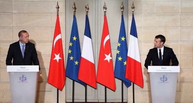 Erdou011fan (L) and Macron during a press conference (Reuters Photo)