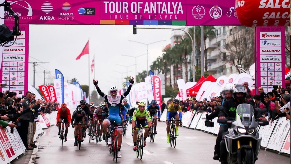 A cyclist cheers as he reaches the finish line in one of the stages in the first edition of Tour of Antalya in 2018. This year's event will bring together cyclists from 21 countries.