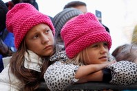 Two young girls listen as Swedish teen environmental activist Greta Thunberg leads a climate change rally in North Carolina, Nov. 8, 2019. (REUTERS)