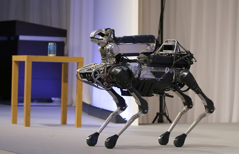 The four-legged SpotMini robot, presented by Boston Dynamics. (AP Photo)