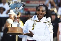Serena Williams poses with the ASB Trophy after winning her finals singles match against Jessica Pegula at the ASB Classic in Auckland, Jan. 12, 2020. (AP Photo)